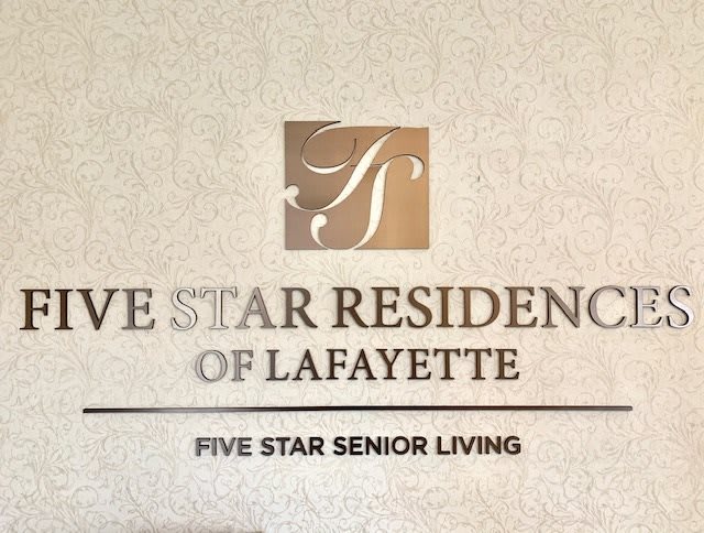 Sign for Five Star Residence of Lafayette, a senior living community.