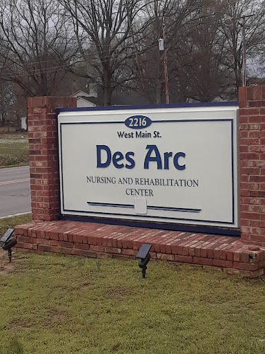Welcome sign for Des Arc Community Rehabilitation Center on West Main Street.