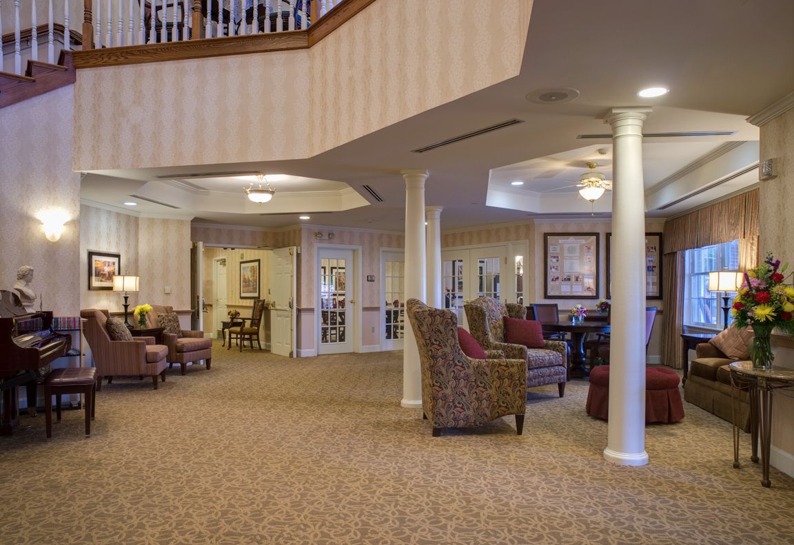 A spacious lobby area with comfortable seating and elegant decor.
