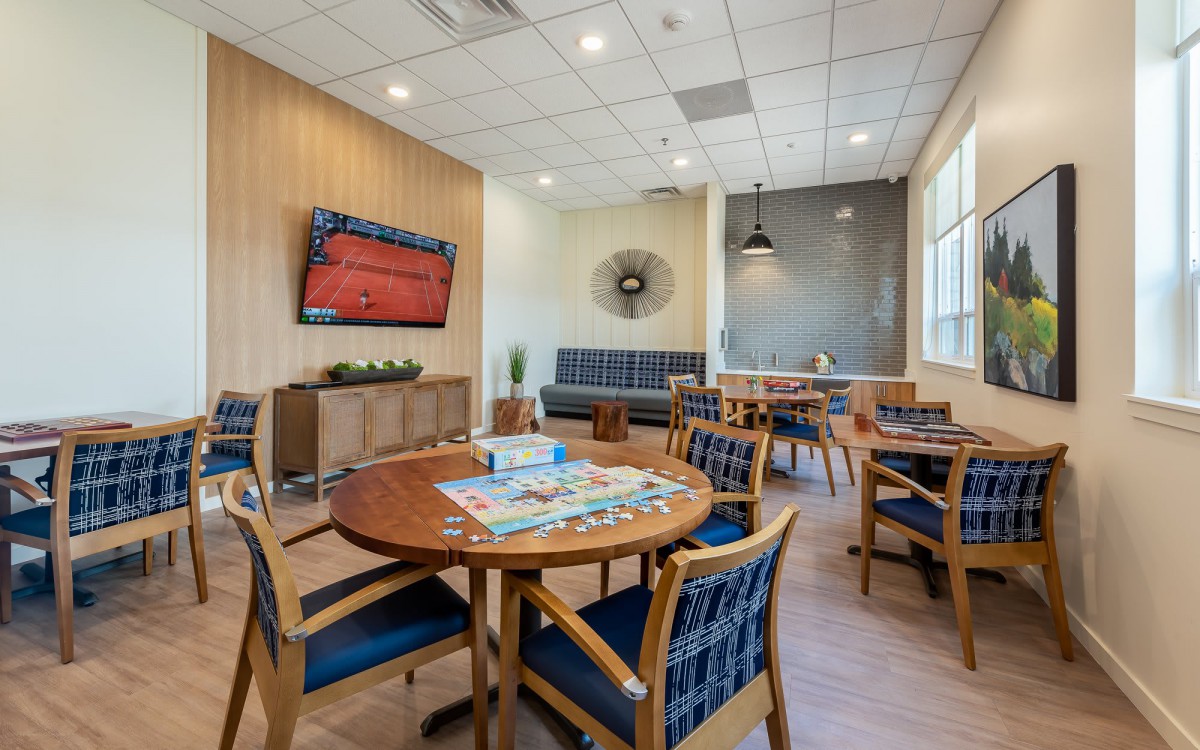 A modern waiting room with comfortable seating and stylish decor.