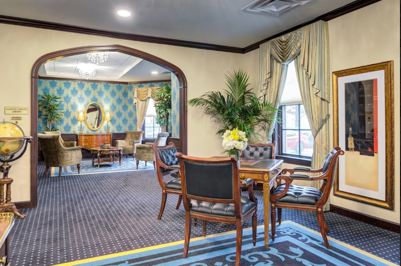 Elegant hotel lobby with seating area and classic decor.