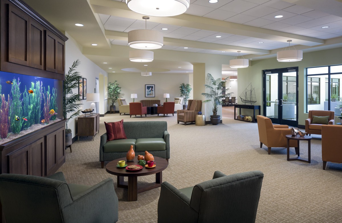 A spacious and modern lobby with comfortable seating and elegant lighting.