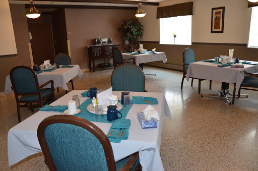 A well-organized dining area featuring neatly set tables and a calm atmosphere.