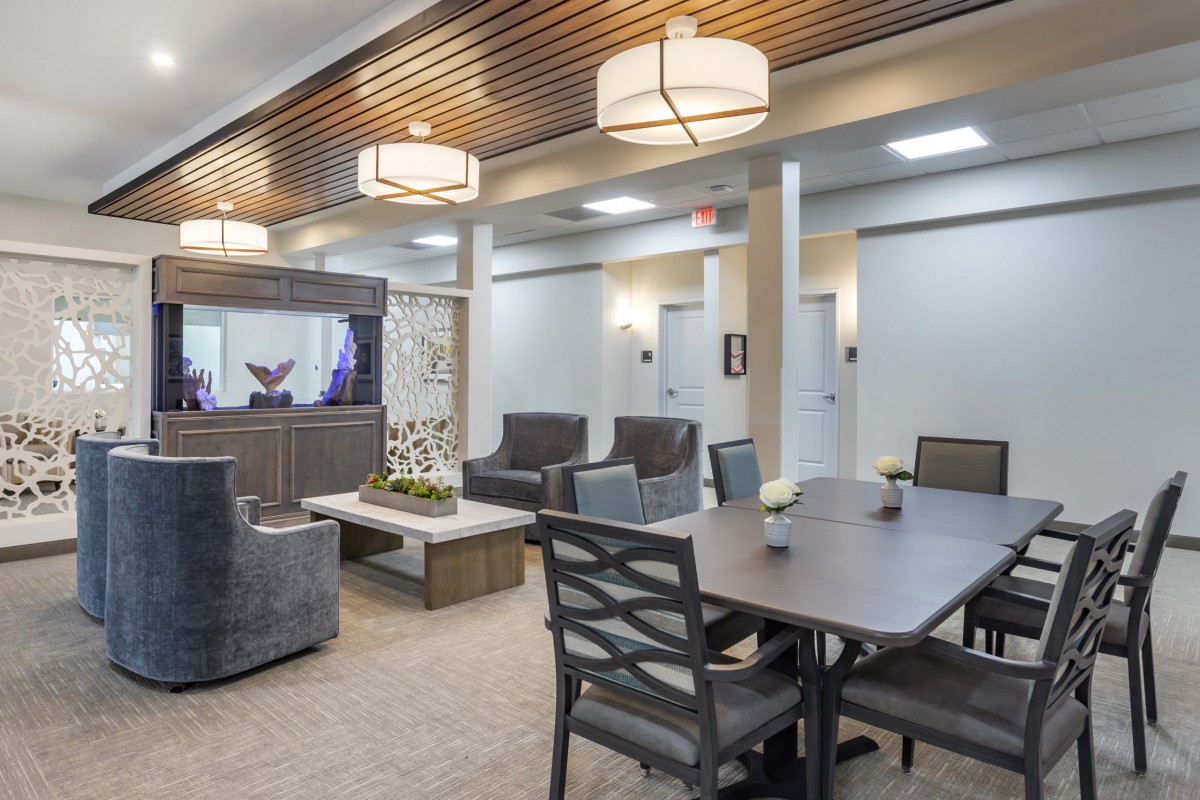 A modern lobby featuring comfortable seating and elegant lighting.