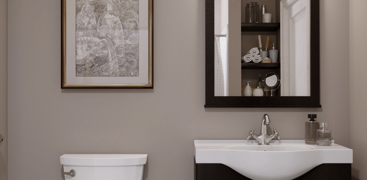 A modern bathroom with a sink, mirror, and wall art.