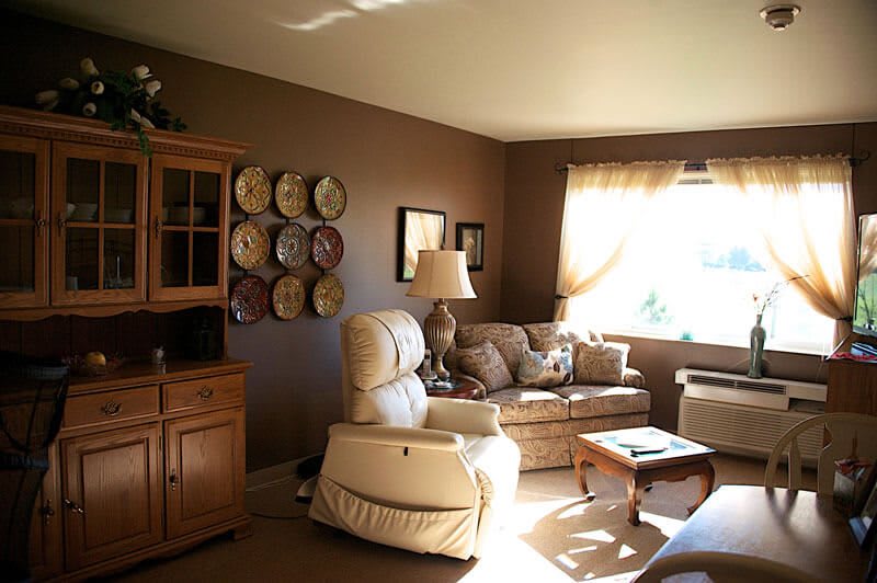 A cozy living room with comfortable seating and warm decor.
