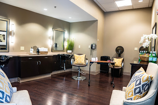 A modern and stylish hair salon interior designed for comfort and aesthetics.