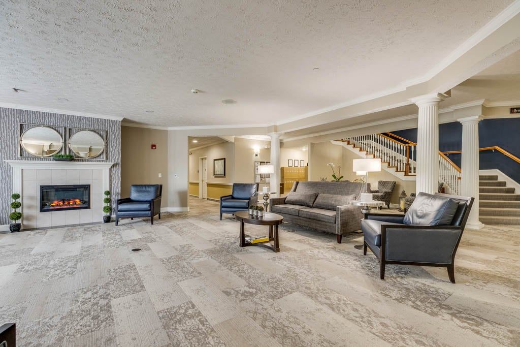 A modern and spacious lobby with comfortable seating and elegant decor.