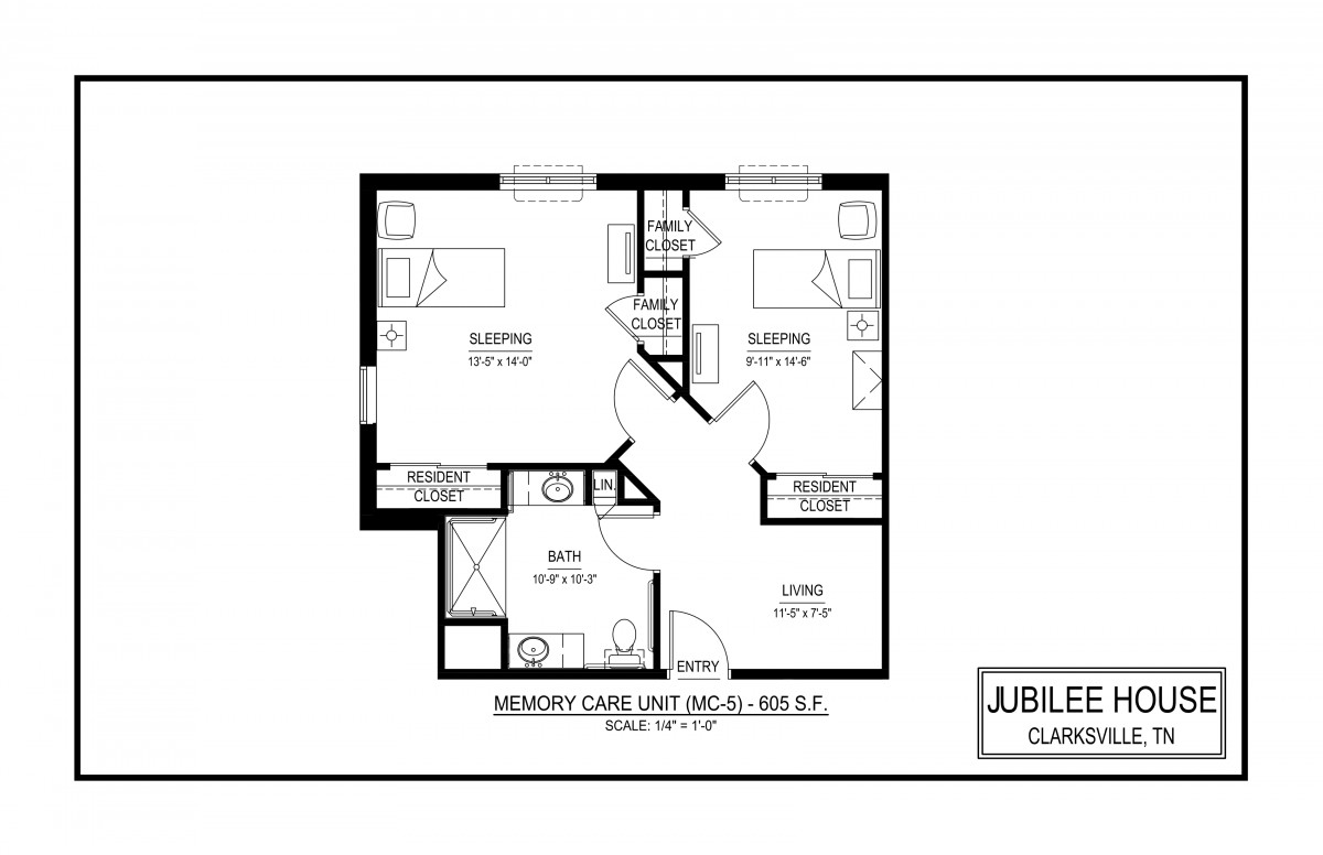 A detailed floor plan for a residential unit with two bedrooms, a kitchen, and a living area.