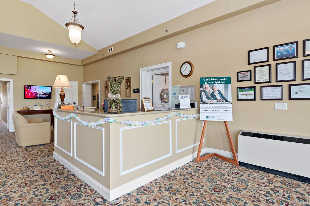 A welcoming reception area with a desk and decorative elements.
