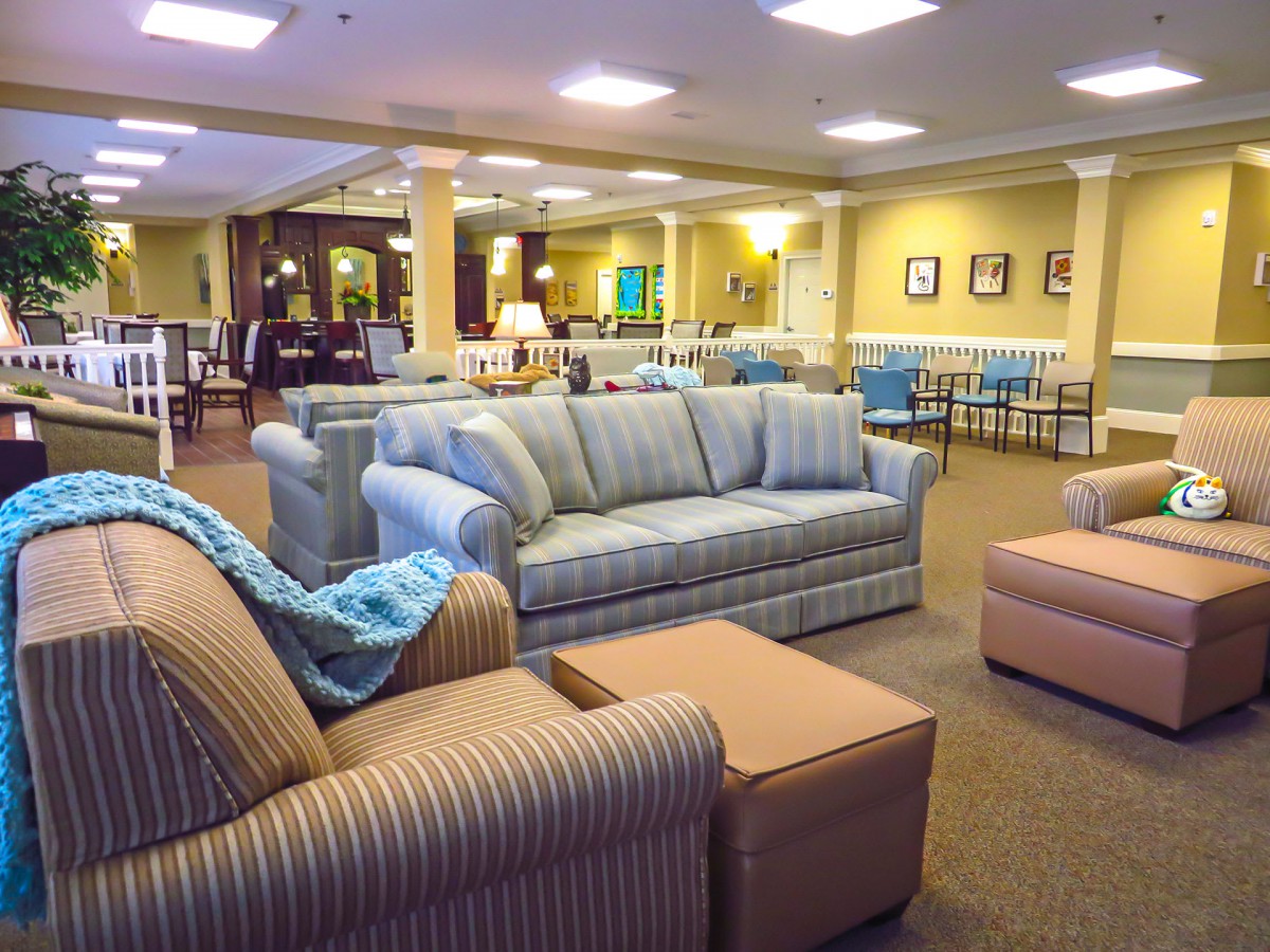 A spacious and cozy lobby with comfortable seating arrangements.
