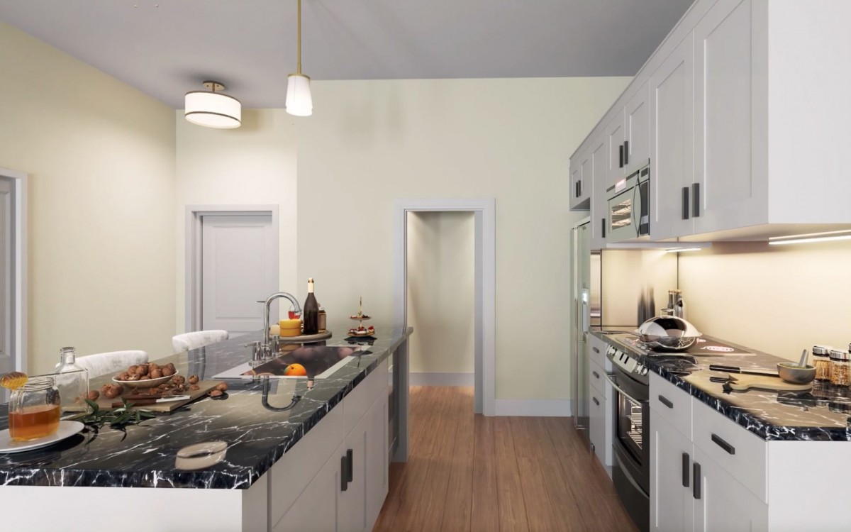 A modern kitchen with a central island, equipped with contemporary appliances and stylish lighting.