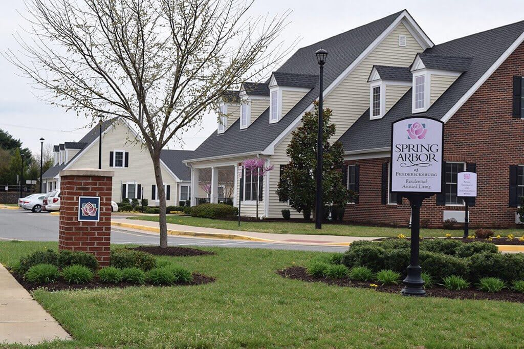 A view of a suburban neighborhood with modern houses and well-maintained landscaping.