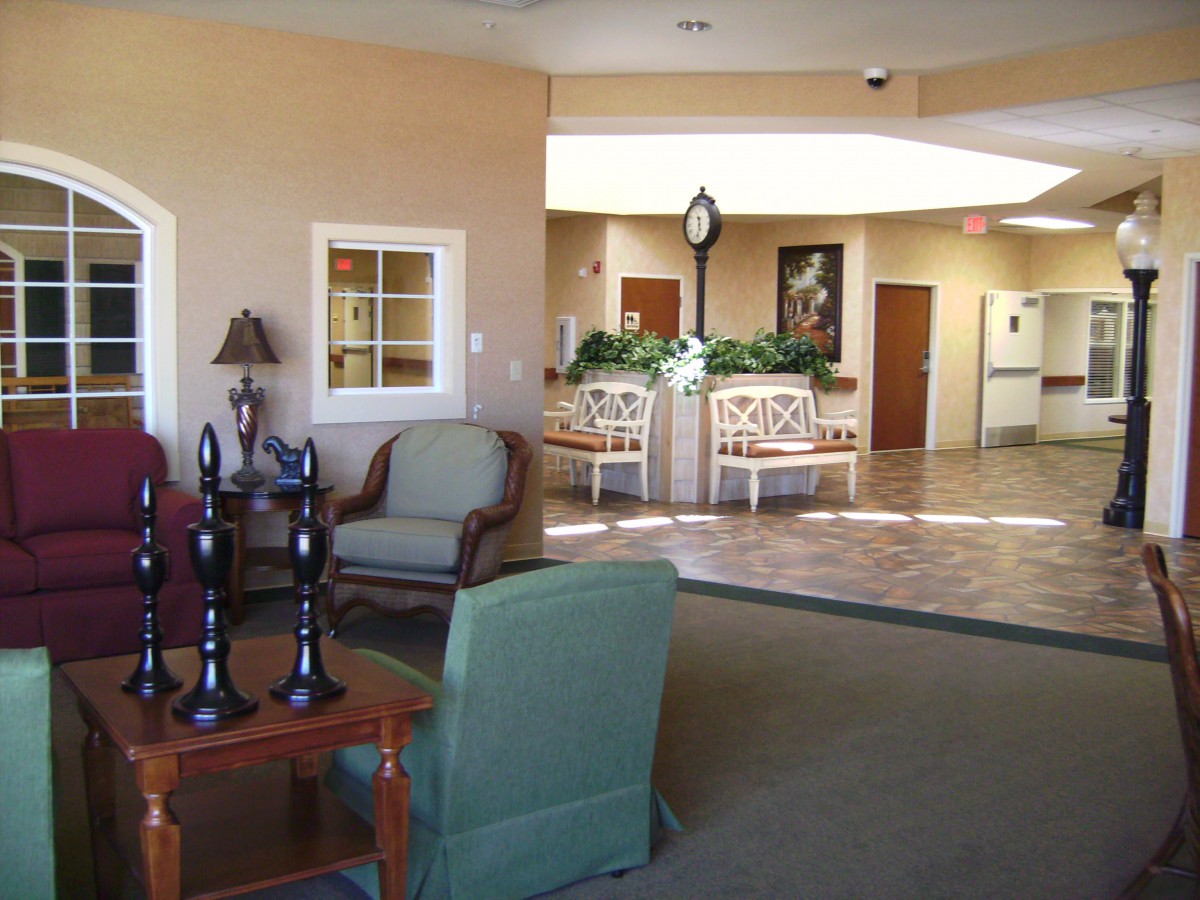 A cozy lobby area with comfortable seating and decorative elements.