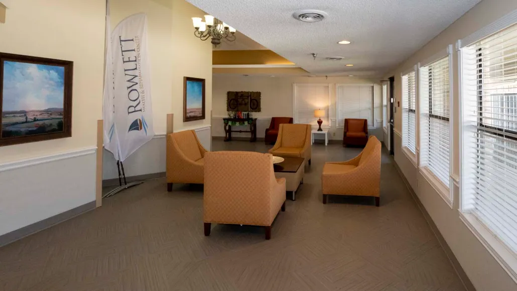 A cozy lobby with comfortable seating arrangements and warm lighting.