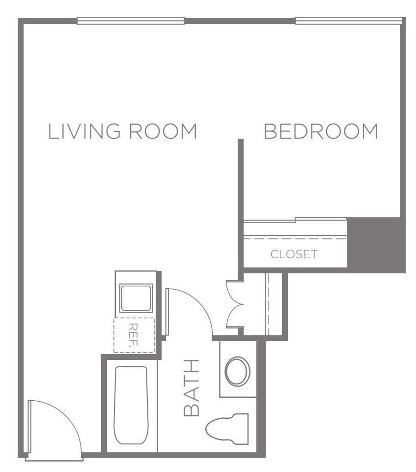 A simple floor plan showing a one-bedroom apartment with a living room, bathroom, and closet.