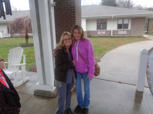 Two friends enjoying a moment together outdoors.