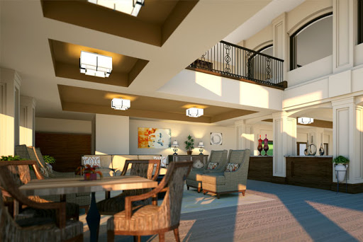 A beautifully designed modern living room with ample natural light and elegant furniture.
