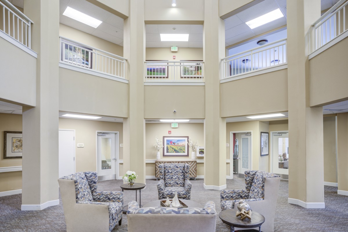 A modern lobby with a spacious seating area and stylish decor.