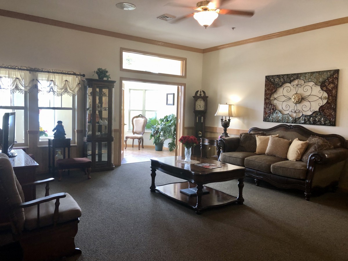 Cozy living room with comfortable seating and elegant decor.