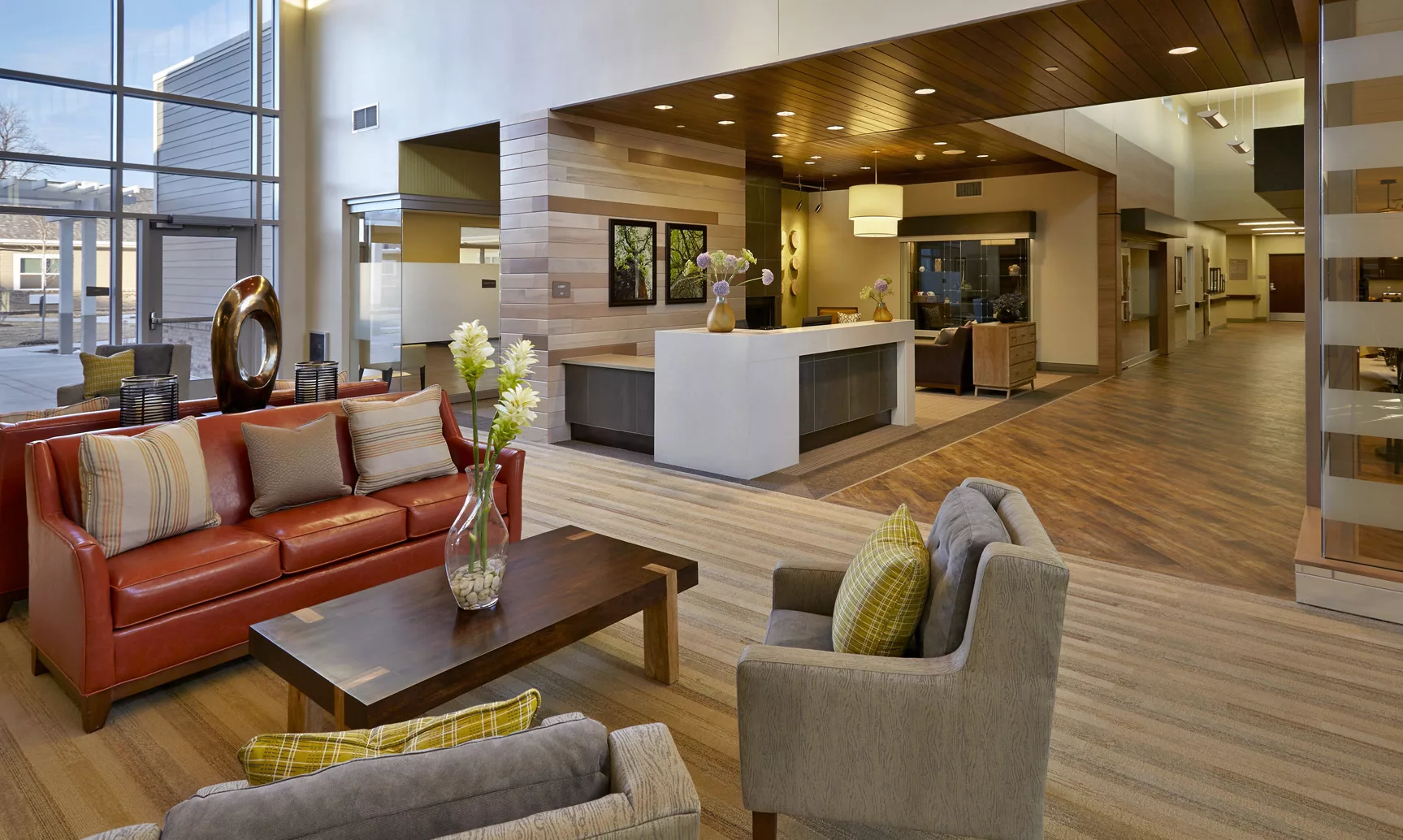 A modern lobby with a seating area featuring contemporary furniture and elegant interior design.