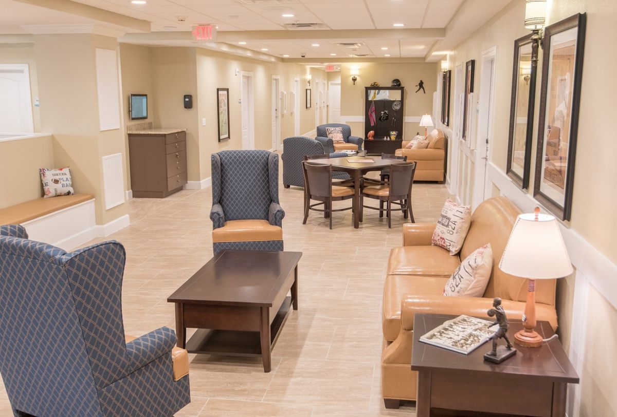 A spacious and inviting lobby area with comfortable seating and warm lighting.