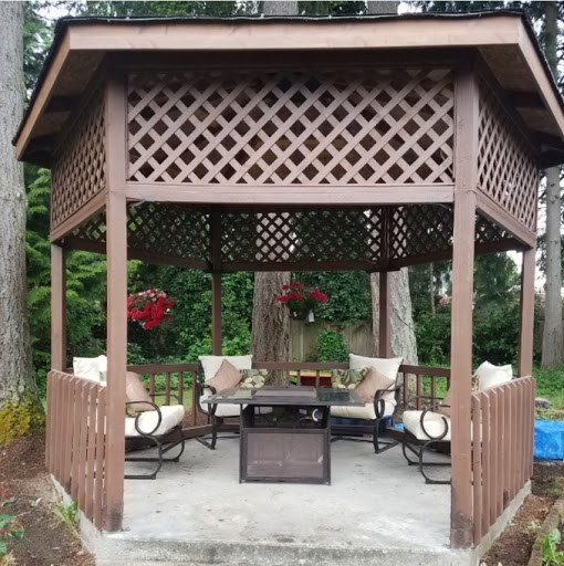 A cozy gazebo set in a peaceful outdoor area, perfect for relaxation.