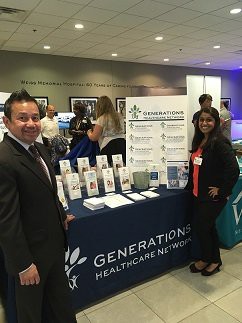 Healthcare professionals networking at a conference exhibit booth.