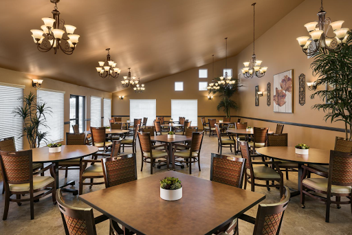A spacious and inviting dining area, designed for comfort and ambiance.