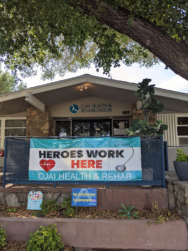 A welcoming facility featuring a banner that says 'Heroes Work Here' at Dual Health & Rehab.