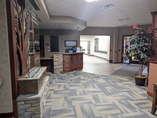 A modern reception area featuring stylish flooring and a welcoming ambiance.