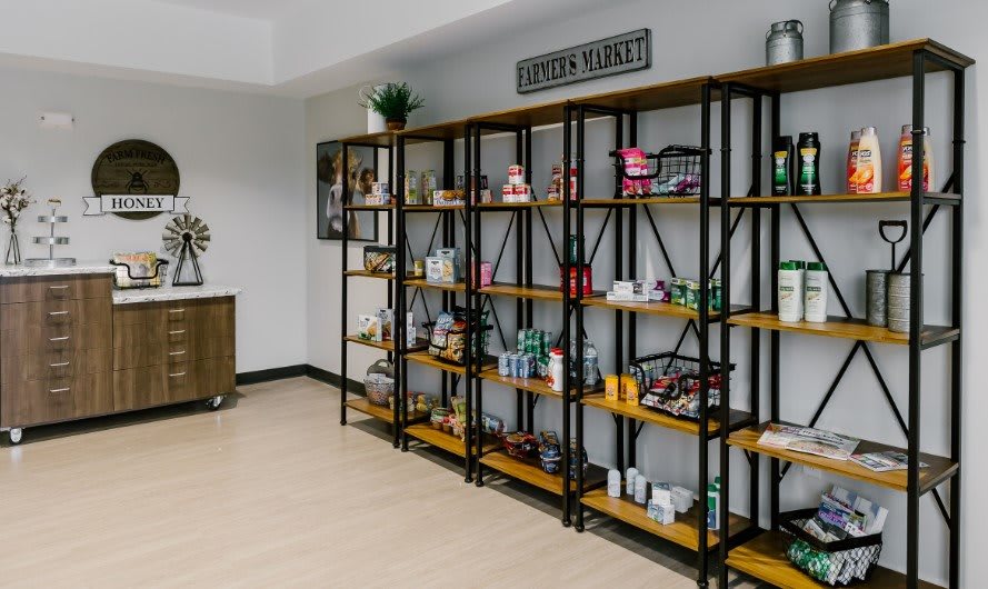 A store interior with wooden shelves displaying various products.