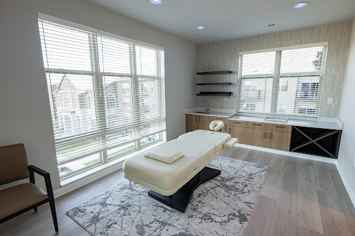 A serene and inviting massage room designed for relaxation and wellness.