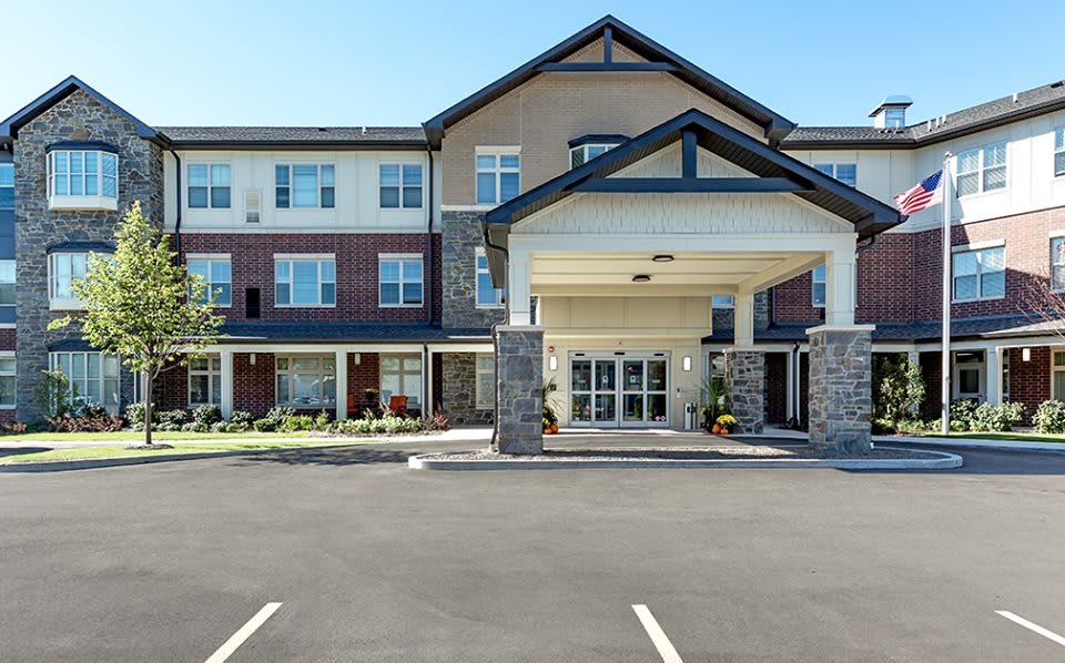 A modern residential building with a welcoming entrance and well-maintained facade.