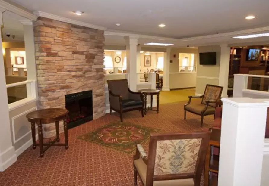 Cozy living room with a fireplace and comfortable seating.