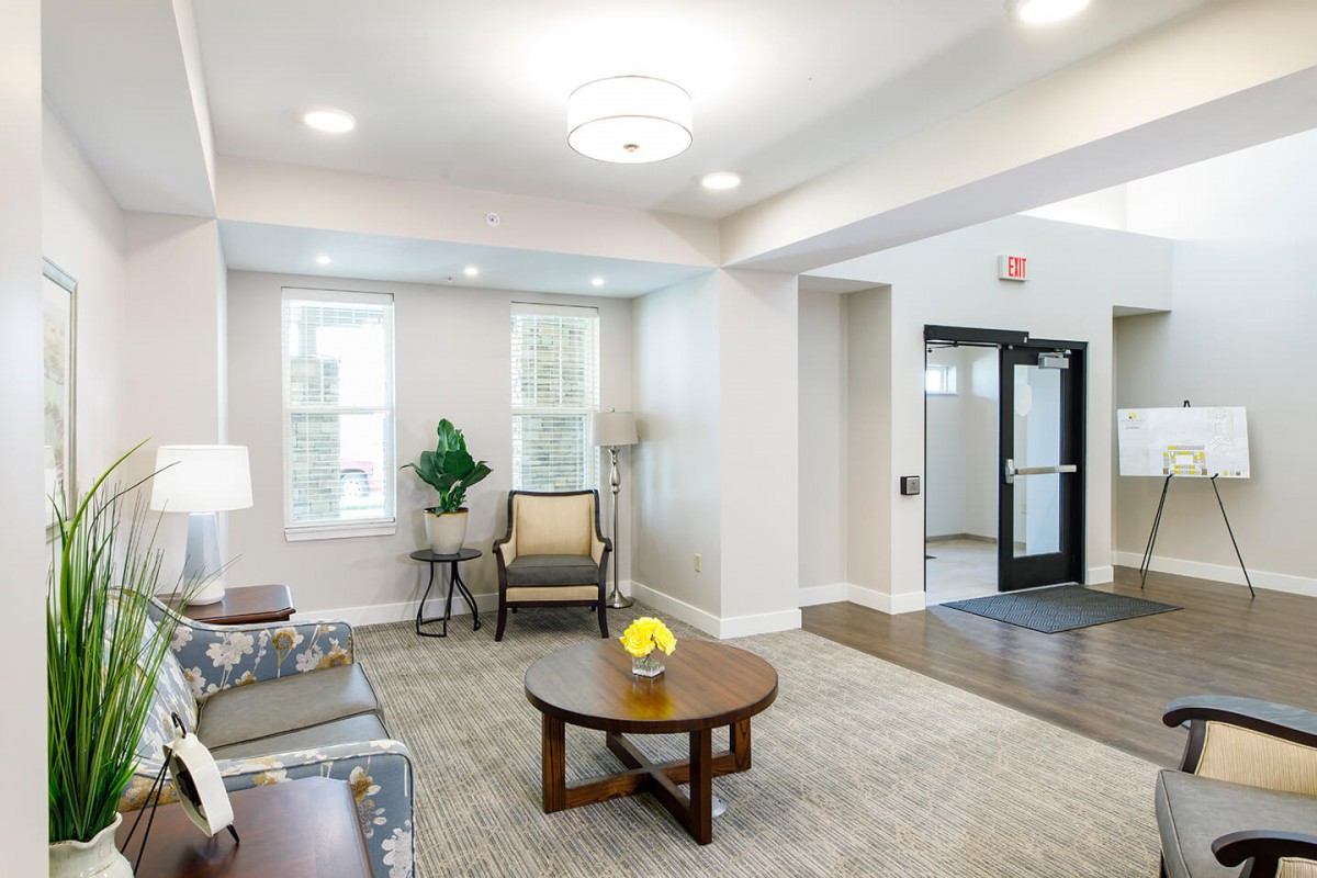 A modern living room with comfortable seating and stylish decor.