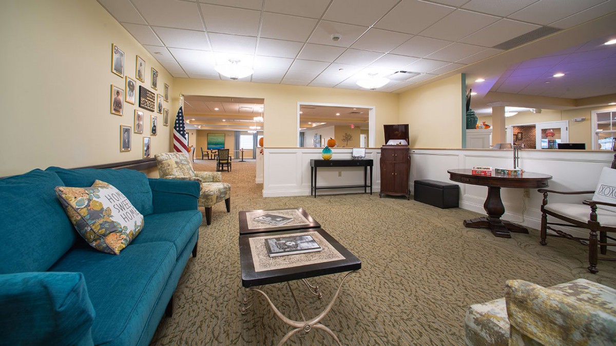 A cozy indoor living area with a sofa, coffee table, and decorations.