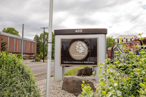 A business sign indicating the location of a firm specializing in architecture and engineering.