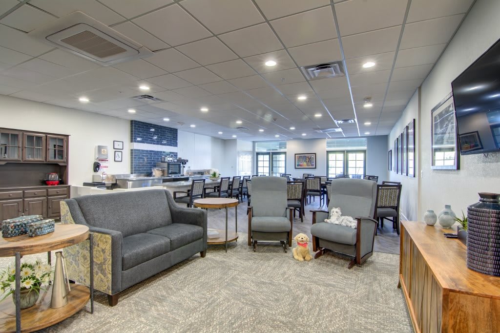 Spacious lobby area with comfortable seating and soft lighting.