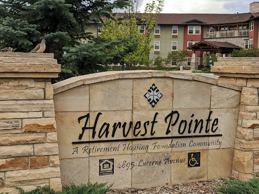 Entrance sign for Harvest Pointe, a residential living community.