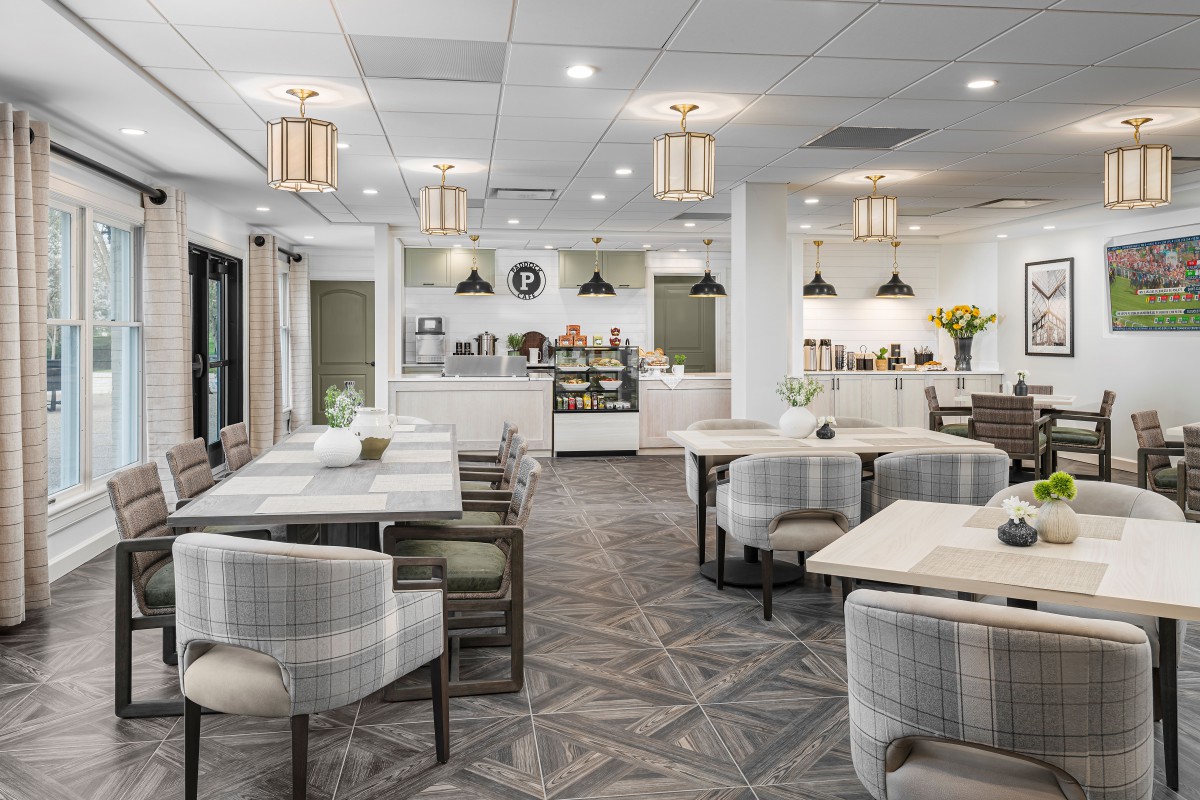 A modern and elegant dining area with stylish seating and lighting.