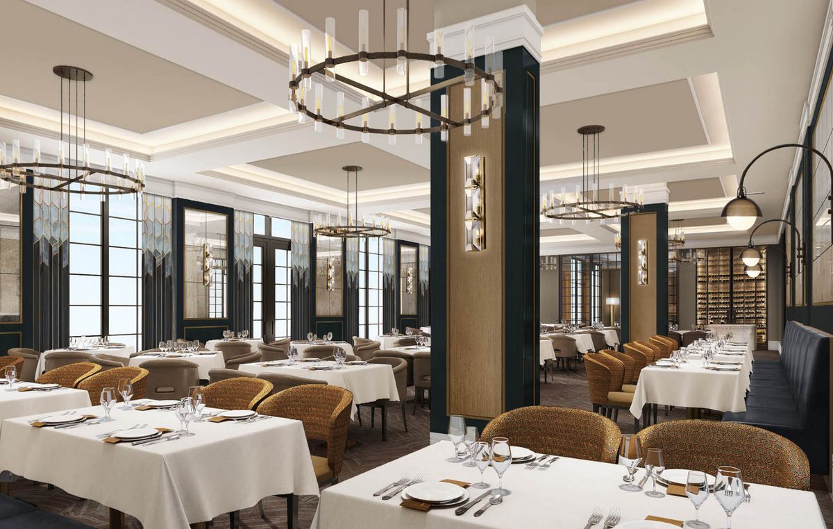 An elegant dining area featuring chandeliers and finely set tables.