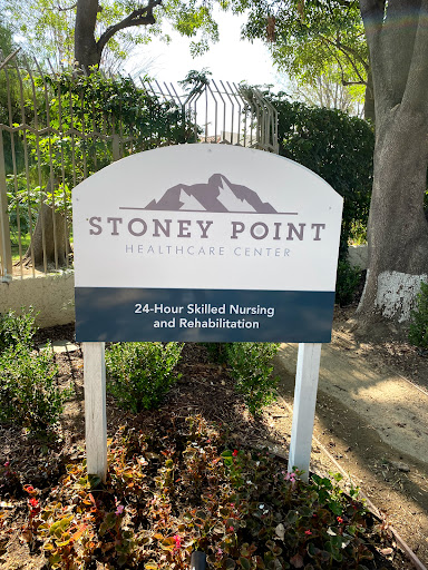 Sign for Stoney Point, a facility offering 24-hour skilled nursing and rehabilitation services.