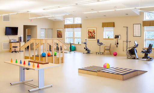 A well-equipped physical therapy room designed for rehabilitation exercises.