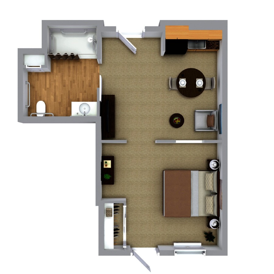 A compact apartment floor plan featuring a bedroom, living area, kitchen, and bathroom.