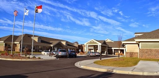 A modern healthcare facility on a clear sunny day.