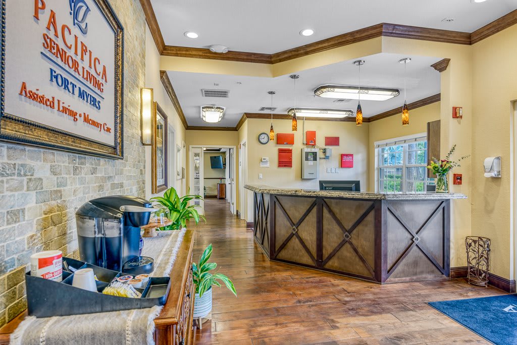 Modern reception area with stylish decor and wood flooring.