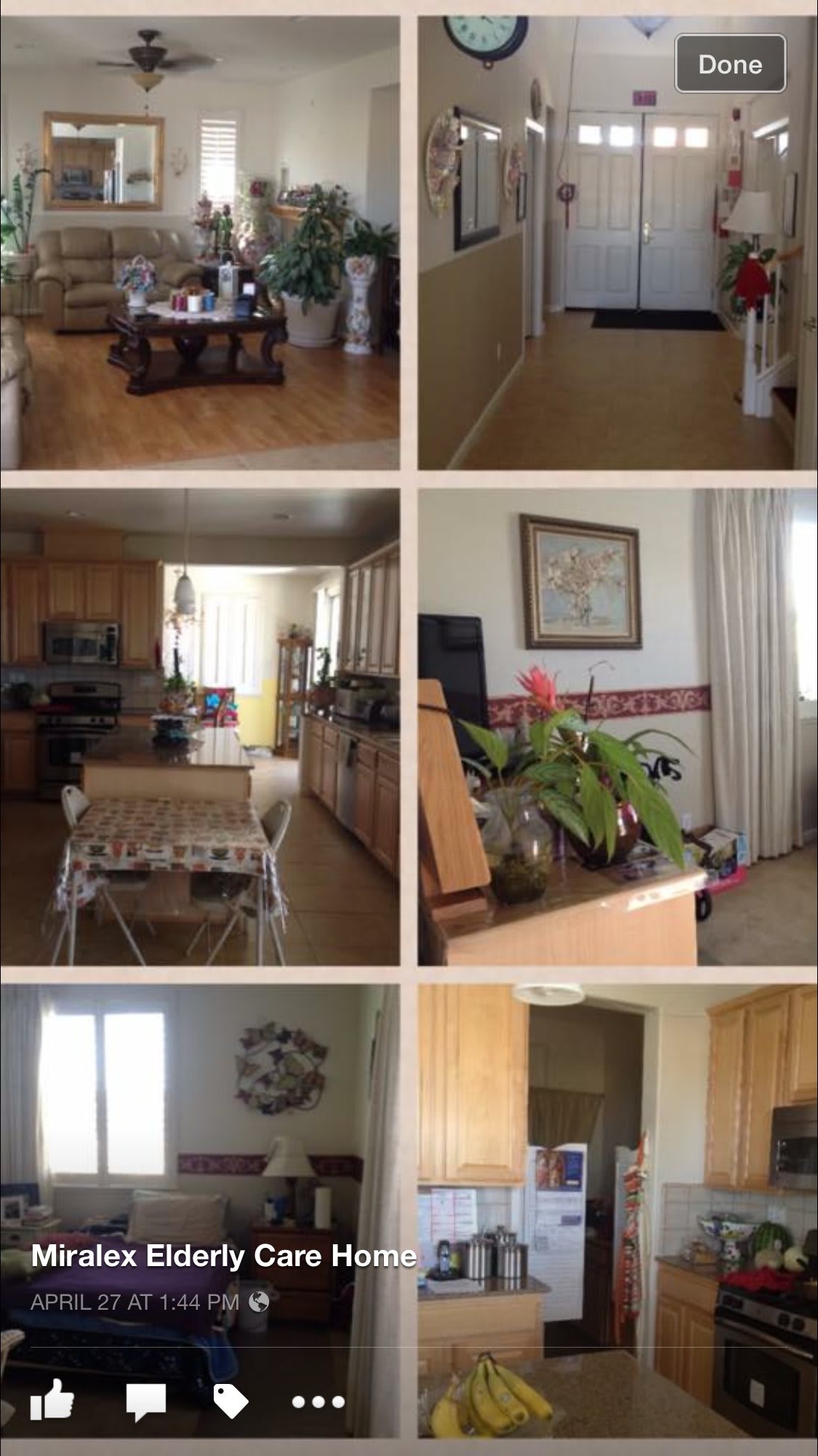A cozy home interior showcasing a kitchen and living room area, complete with furniture and decorative elements.