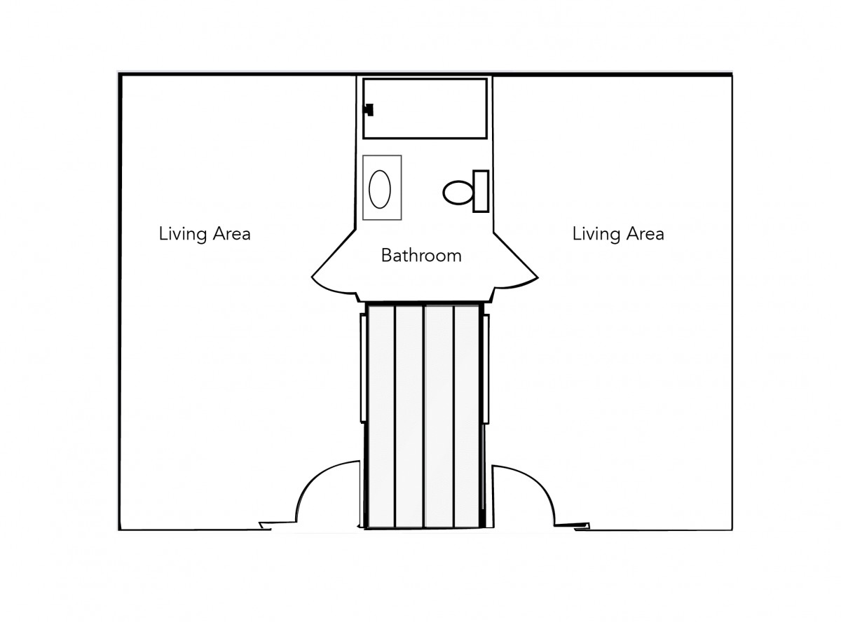 A simple floor plan featuring a bathroom between two living areas.