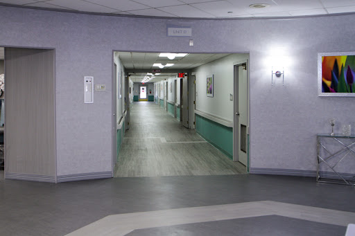 A view of a hospital corridor, illustrating the clean and sterile environment typical in healthcare facilities.